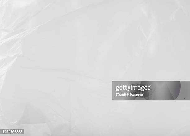 close-up of empty plastic bag background - transparent plastic stock pictures, royalty-free photos & images