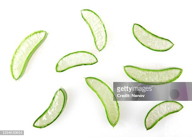sliced aloe vera pieces isolated on white - aloe slices stock pictures, royalty-free photos & images