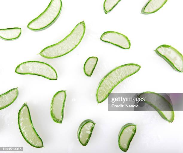 sliced aloe vera pieces isolated on white - aloe slices stock pictures, royalty-free photos & images