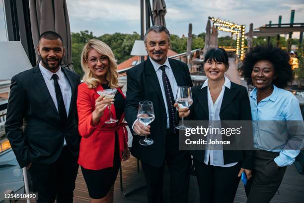 portrait of smiling business people - cocktail party work stock pictures, royalty-free photos & images