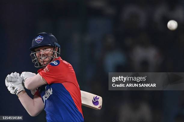 Delhi Capitals' David Warner plays a shot during the Indian Premier League Twenty20 cricket match between Delhi Capitals and Punjab Kings at the Arun...