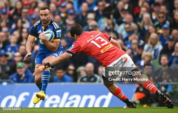Dublin , Ireland - 13 May 2023; Dave Kearney of Leinster is tackled by Antoine Frisch of Munster during the United Rugby Championship Semi-Final...