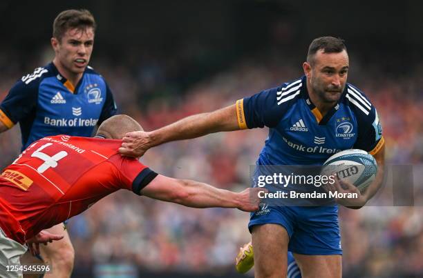 Dublin , Ireland - 13 May 2023; Dave Kearney of Leinster is tackled by Keith Earls of Munster during the United Rugby Championship Semi-Final match...