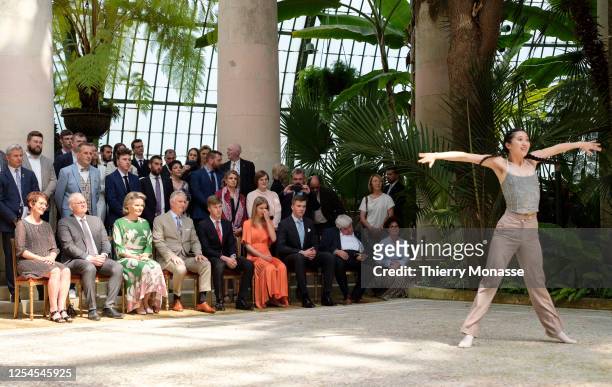 Queen Mathilde d'Udekem d'Acoz, King Philippe of Belgium, Prince Emmanuel, Princess Eleonore, Duchess of Brabant and Prince Gabriel look at a dance...