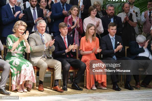 Queen Mathilde d'Udekem d'Acoz, King Philippe of Belgium, Prince Emmanuel, Princess Eleonore, Duchess of Brabant and Prince Gabriel look at a dance...