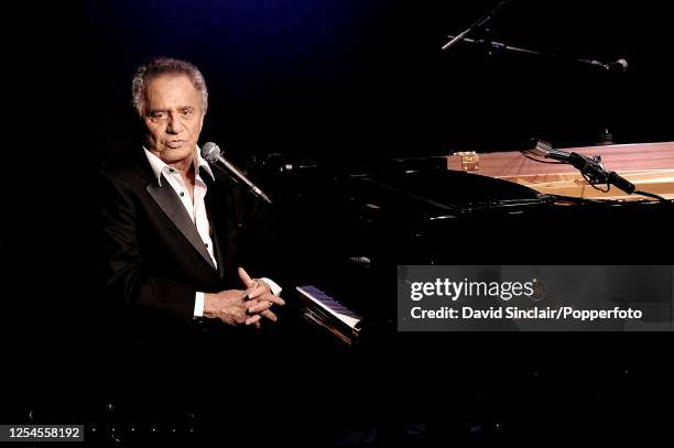 American singer and pianist Buddy Greco performs live on stage at Ronnie Scott's Jazz Club in Soho, London on 18th June 2009.