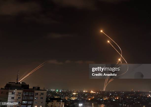 Palestinian groups respond by firing hundreds of rockets and mortar shells from Gaza to Israel as Israel continued its air strikes, in Gaza City,...