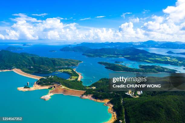 wide angle aerial view of high island reservoir, west dam of sai kung peninsula, hong kong, outdoor, daytime - china reservoir stock pictures, royalty-free photos & images