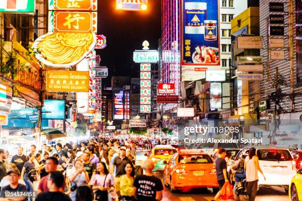 crowds of people in chinatown at night, bangkok, thailand - bangkok imagens e fotografias de stock