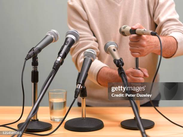 press conference being set up - sound engineer stock pictures, royalty-free photos & images