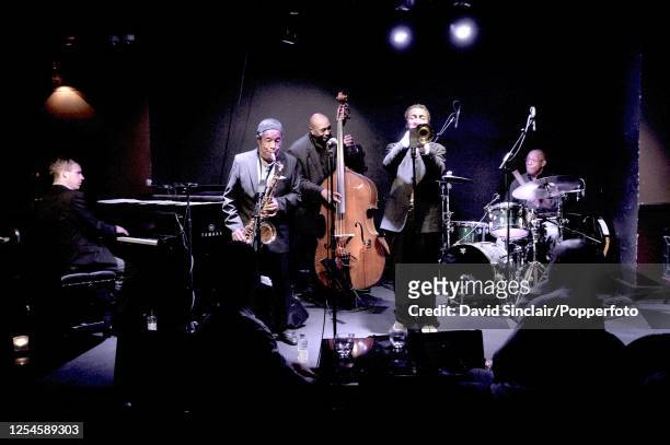 American saxophonist Johnny Griffin performs live on stage with trumpeter Roy Hargrove , pianist James Pearson, double bassist Reggie Johnson and...