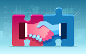 Partnership and agreement concept. Vector of two businessmen handshaking with handscoming out of puzzle pieces