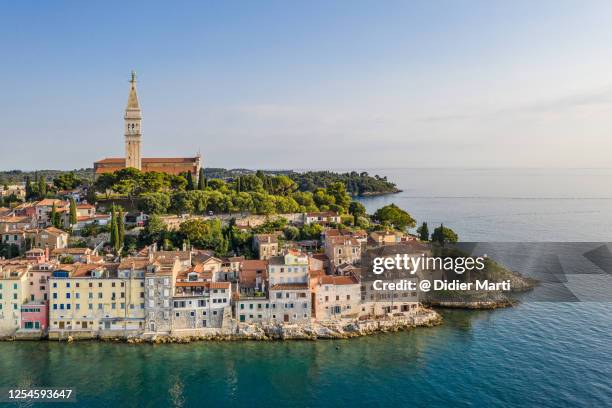 aerial view of the rovinj old town by the adriatic sea in croatia - istria foto e immagini stock