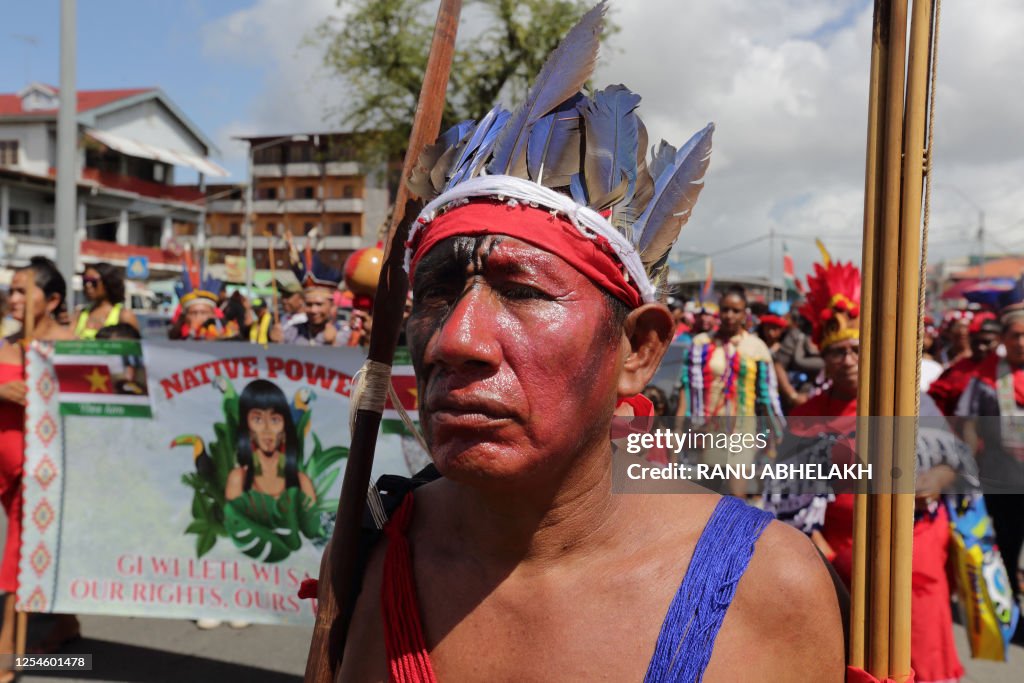 Indigenous people from several tribes frome Suriname participate in a