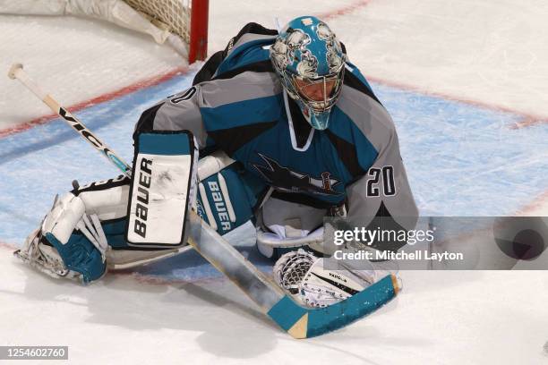 Evgeni Nabokov of the San Jose Sharks makes a save during a NHL hockey game against the Washington Capitals at MCI Center on November 19, 2002 in...