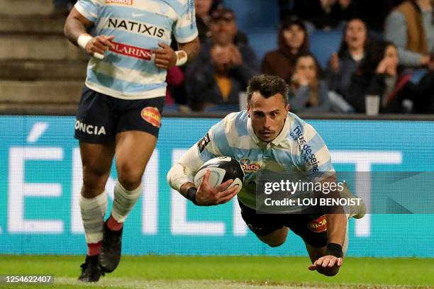 Racing92's Argentinian wing Juan Imhoff scores a try during the French Top14 rugby union match between Racing 92 and Rugby Club Toulonnais at the...