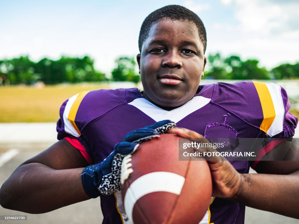 Junior Football player getting ready