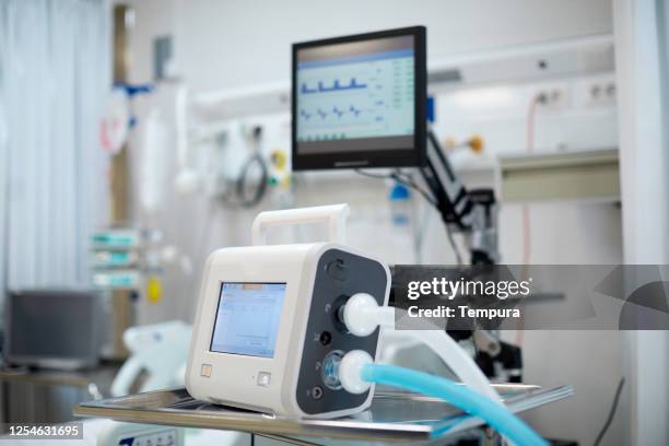 close up view of a portable medical ventilator on a table - medical ventilator stock pictures, royalty-free photos & images