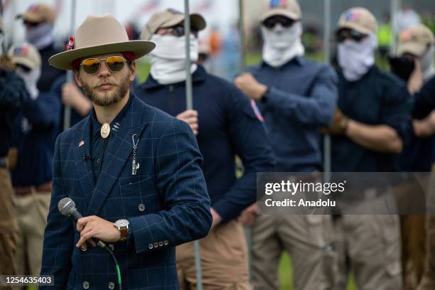 May 13:Members of the far-right group Patriot Front listen as their leader Thomas Rousseau speaks in front of the Washington Monument in Washington,...