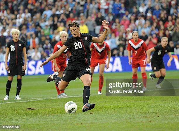 Forward Abby Wambach of the United States scores on a penalty kick early in the first half against Canada on September 17, 2011 at LiveStrong...
