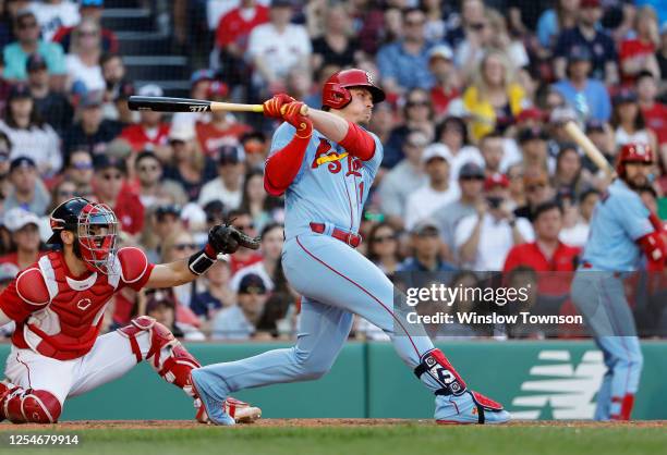 Nolan Gorman of the St. Louis Cardinals follows through on his RBI-double against the Boston Red Sox during the ninth inning at Fenway Park on May...