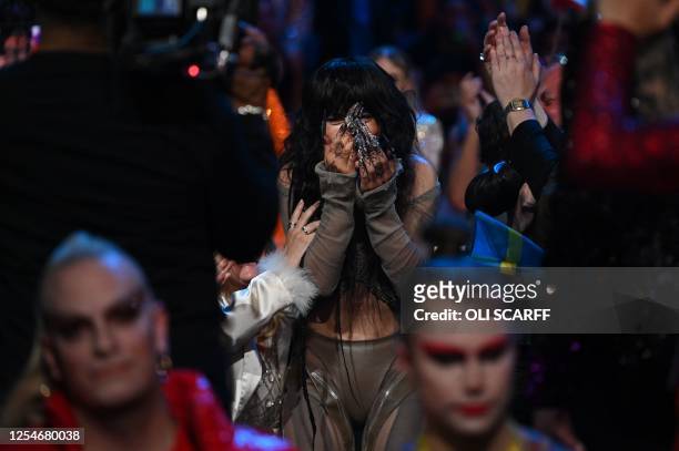 Singer Loreen performing on behalf of Sweden reacts after winning the final of the Eurovision Song contest 2023 on May 13, 2023 at the M&S Bank Arena...