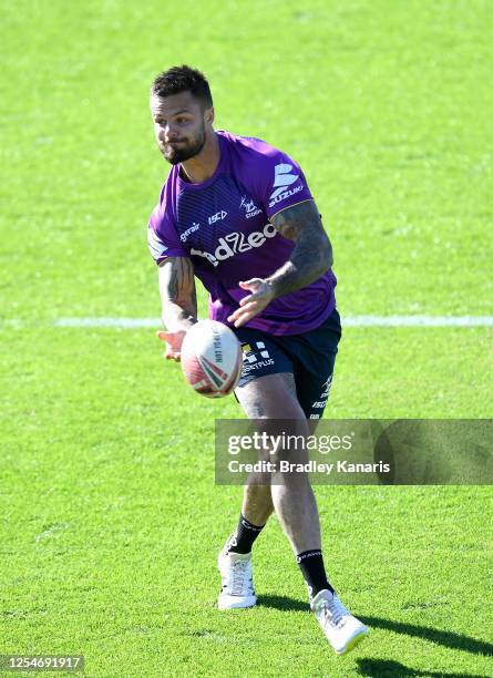 Sandor Earl passes the ball during a Melbourne Storm NRL training session at Sunshine Coast Stadium on July 07, 2020 in Sunshine Coast, Australia.