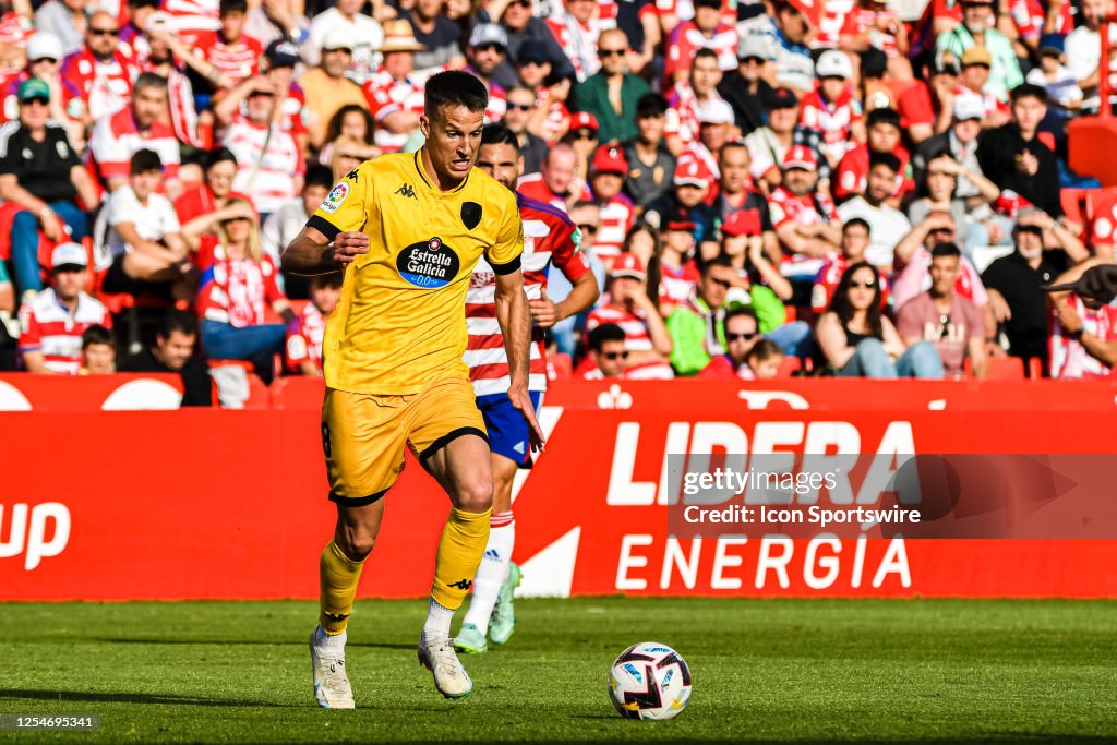 GRANADA, SPAIN MAY 13: Xavi Torres Of CD Lugo Drive The