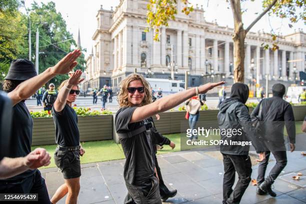 Neo-Nazis protesters salute as they are ordered to leave the area during the demonstration. A day of political tensions and clashes unfolded in...