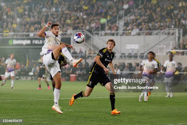 Orlando City forward Ercan Kara traps the ball in the Columbus Crew box during the second half in a game on May 13 at Lower.com Field in Columbus,...