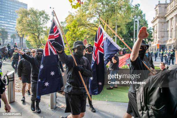 Neo-Nazis protesters with flags salute as they are ordered to leave the area during the demonstration. A day of political tensions and clashes...