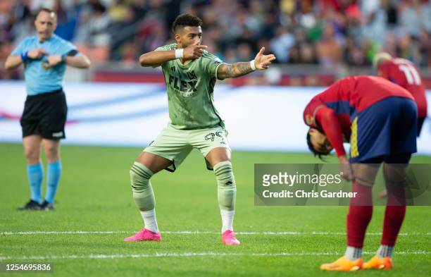 Denis Bouanga of the Los Angeles FC makes a gun shooting gesture after scoring a goal against Real Salt Lake during the first half of their game at...