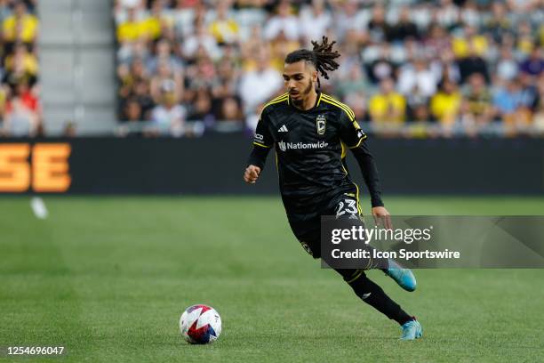 Columbus Crew defender Mohamed Farsi controls the ball during the first half in a game against the Orlando City on May 13 at Lower.com Field in...