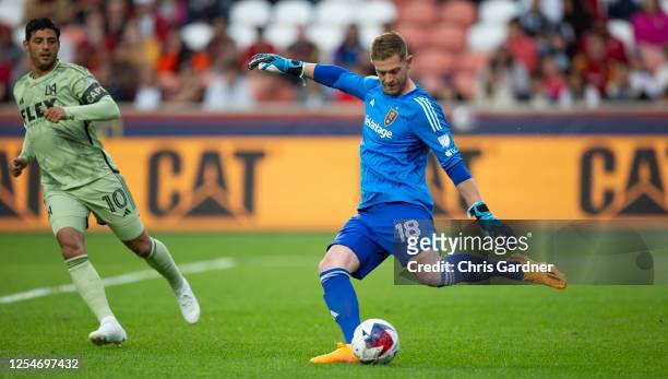 Zac MacMath of Real Salt Lake clears the ball against Carlos Vela of the Los Angeles FC during the first half of their game at America First Field on...