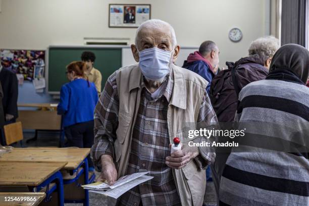 Voters arrive at a polling station cast their ballots for presidential and parliamentary elections in Ankara, Turkiye on May 14, 2023. Millions of...