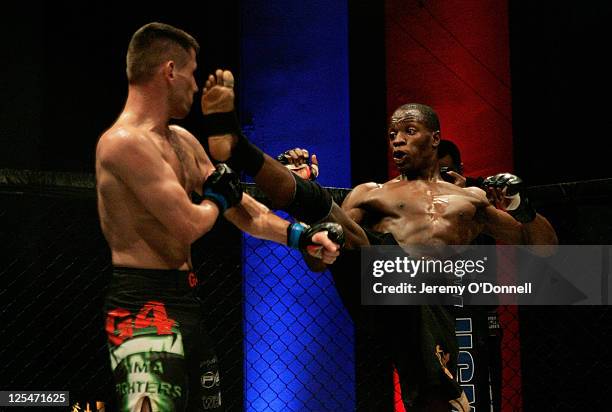 Jason Cooledge takes a kick to the face from Matt Robinson during their bout during Cage Rage UK Ultimate Challenge 23 at The Troxy on September 17,...