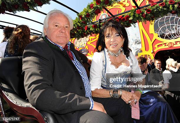 Eckart Witzigmann and Regine Sixt attend the Oktoberfest beer festival at Hippodrom beer tent on September 17, 2011 in Munich, Germany.