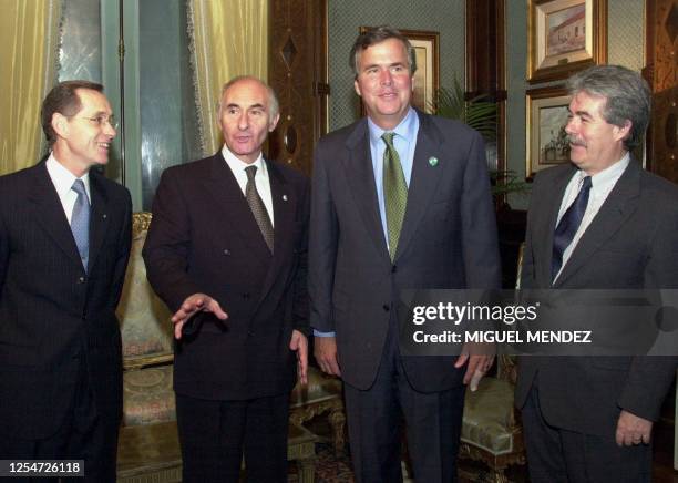 Argentine President Fernando de la Rua , US governor of Florida Jeb Bush , US Ambassador to Argentina James Walsh , and Argentina's Foreign Minister...