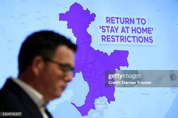 Graphic is seen showing the areas of Melbourne that will be required to go into lock down as Victorian Premier Daniel Andrews speak to the media on...