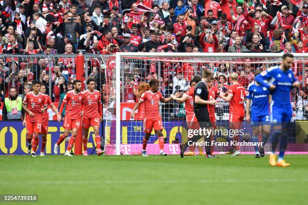 Players of FC Bayern Muenchen celebrate after scoring a goal at the Bundesliga match between FC Bayern Muenchen and FC Schalke 04 at Allianz Arena on...