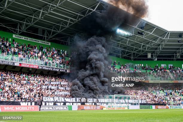 Players supporters of FC Groningen during the Dutch premier league match between FC Groningen and Ajax at Euroborg stadium on May 14, 2023 in...