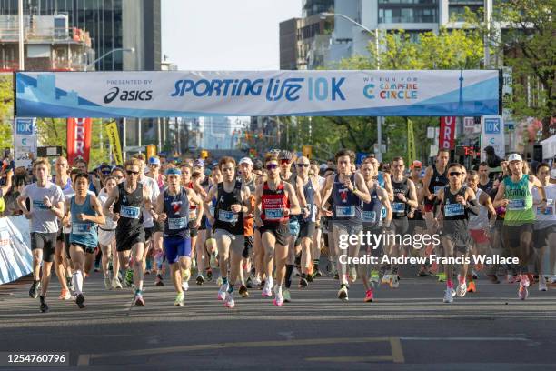May 14 - The Sporting Life 10K run starts on Yonge St in Toronto, May 14, 2023. The run raises money for Campfire Circle, a charity that provides...