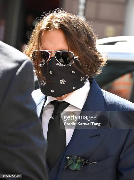 Johnny Depp arrives for the libel case against the Sun Newspaper at the Royal Courts of Justice, Strand on July 07, 2020 in London, England. The...