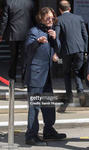 Johnny Depp arrives at Royal Courts of Justice, Strand on July 07, 2020 in London, England. The American actor is taking News Group Newspapers,...