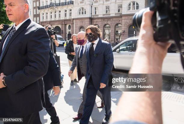 Johnny Depp arrives at Royal Courts of Justice, Strand on July 07, 2020 in London, England. The American actor is taking News Group Newspapers,...