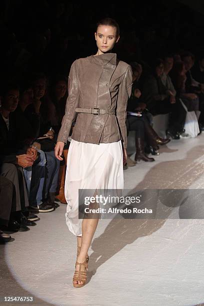 Model walks the runway at the Luis Buchinho show at Lisbon Fashion Week Spring/Summer 2011 on October 8, 2010 in Lisbon, Portugal.