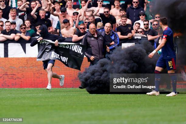 Supporter, a banner on the field during the Dutch Eredivisie match between FC Groningen and AFC Ajax at Euroborg on May 14, 2023 in Groningen,...