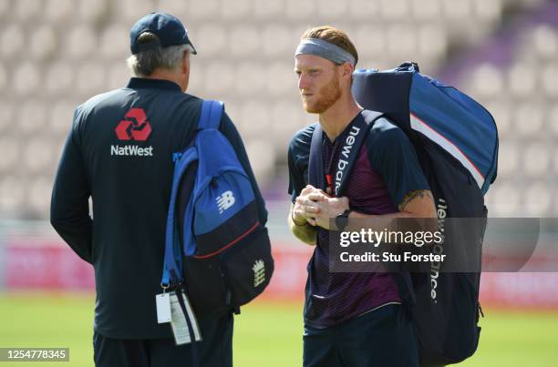 England captain Ben Stokes speaks with coach Chris Silverwood during a nets session at Ageas Bowl on July 07, 2020 in Southampton, England.