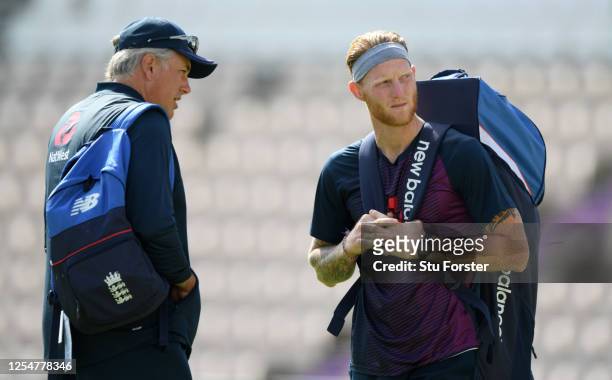 England captain Ben Stokes speaks with coach Chris Silverwood during a nets session at Ageas Bowl on July 07, 2020 in Southampton, England.