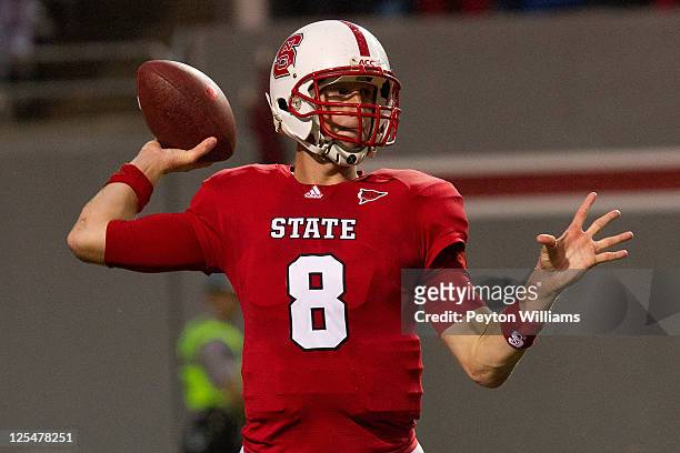 Quarterback Mike Glennon of the North Carolina State Wolfpack throws a pass while playing the South Alabama Jaguars on September 17, 2011 at...